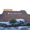 Snow decorates the entrance to Court Moor School